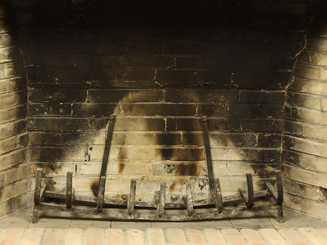 Damaged and soot covered firebox before repair