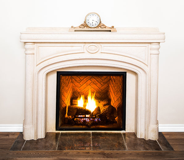 Beautiful, Completed Fireplace Restoration with herringbone masonry in the firebox and a white surround and mantle