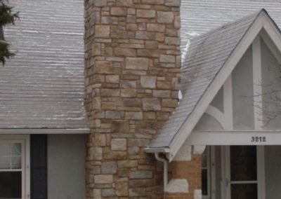 Completed Custom Chimney Wall Rebuild with Stone Masonry