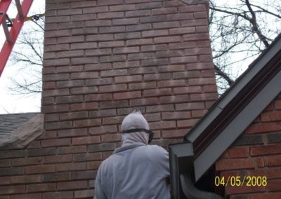 Technician performing Chimney Crack Repair