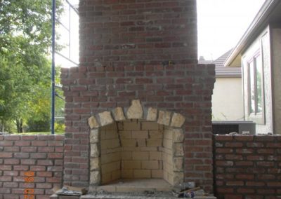 Exterior Fireplace restoration in progress