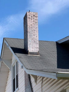 White Masonry Chimney on Roof - Kansas City MO - Sleep Easy Chimney Service & Repair