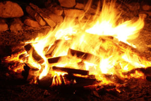 roaring fire of a firepit