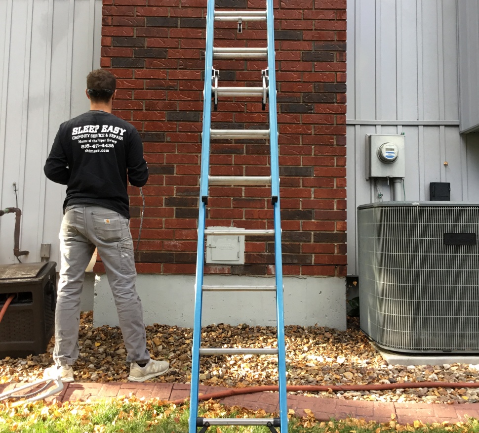 sleep easy crew on the job tall chimney photo